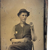 Shepherd-esque Beautiful Pink Cheeked Young Man in Floppy Hat with Walking Stick