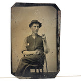 Shepherd-esque Beautiful Pink Cheeked Young Man in Floppy Hat with Walking Stick