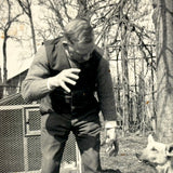 The Power of the Hand: Man and German Shepherd in Backyard, c. 1940s Mounted Snapshot Photo