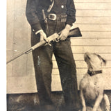 Man with Knife and Rifle, Dog with Head Turned, Large Paper Print Photo