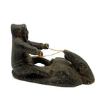 Striking and Sensitive Inuit Stone Carving of Man and Seal with Sinew Reins (Shoulder Repair)