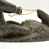 Striking and Sensitive Inuit Stone Carving of Man and Seal with Sinew Reins (Shoulder Repair)