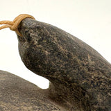 Striking and Sensitive Inuit Stone Carving of Man and Seal with Sinew Reins (Shoulder Repair)