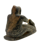 Striking and Sensitive Inuit Stone Carving of Man and Seal with Sinew Reins (Shoulder Repair)