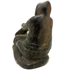 Striking and Sensitive Inuit Stone Carving of Man and Seal with Sinew Reins (Shoulder Repair)