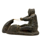 Striking and Sensitive Inuit Stone Carving of Man and Seal with Sinew Reins (Shoulder Repair)