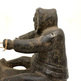 Striking and Sensitive Inuit Stone Carving of Man and Seal with Sinew Reins (Shoulder Repair)