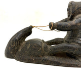 Striking and Sensitive Inuit Stone Carving of Man and Seal with Sinew Reins (Shoulder Repair)