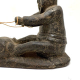 Striking and Sensitive Inuit Stone Carving of Man and Seal with Sinew Reins (Shoulder Repair)