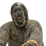Striking and Sensitive Inuit Stone Carving of Man and Seal with Sinew Reins (Shoulder Repair)