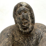 Striking and Sensitive Inuit Stone Carving of Man and Seal with Sinew Reins (Shoulder Repair)