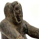 Striking and Sensitive Inuit Stone Carving of Man and Seal with Sinew Reins (Shoulder Repair)