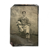 Melancholic Looking Young Man Against Whispy, Moody Painted Backdrop