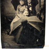 Threesome with Two Umbrellas and a Perched Bowler, Curious Antique Tintype