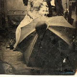 Threesome with Two Umbrellas and a Perched Bowler, Curious Antique Tintype