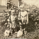 Wonderful Pair of 1920s RPPCS of Same Children, Different Ages, with Mysterious Puff Balls