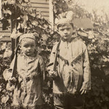 Wonderful Pair of 1920s RPPCS of Same Children, Different Ages, with Mysterious Puff Balls