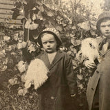 Wonderful Pair of 1920s RPPCS of Same Children, Different Ages, with Mysterious Puff Balls