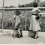 Woman in Stripes, Girl on Crutches, Looking Up at Animal in Tower, Vintage Glossy Snapshot