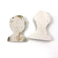 Curious Little Pair of Smiling Chalkware Busts (Flat Backs)