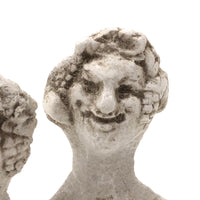 Curious Little Pair of Smiling Chalkware Busts (Flat Backs)