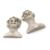 Curious Little Pair of Smiling Chalkware Busts (Flat Backs)