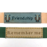 Friendship + Remember Me, Pair of Early Punch Paper Embroideries on Ribbon