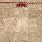 Louise Meyer’s 1884 Red and White Darning Sampler on Linen