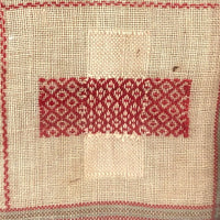 Louise Meyer’s 1884 Red and White Darning Sampler on Linen