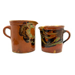 Pair of 19th Century French Rustic Marble Glazed Redware Pitchers