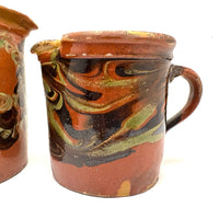 Pair of 19th Century French Rustic Marble Glazed Redware Pitchers