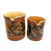 Pair of 19th Century French Rustic Marble Glazed Redware Pitchers