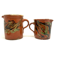 Pair of 19th Century French Rustic Marble Glazed Redware Pitchers