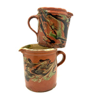 Pair of 19th Century French Rustic Marble Glazed Redware Pitchers