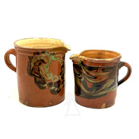 Pair of 19th Century French Rustic Marble Glazed Redware Pitchers