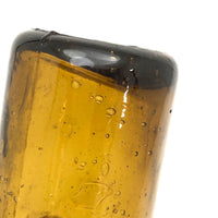 Beautiful 19th C. Blown, Molded Amber Glass Bottle with Profusion of Air Bubbles
