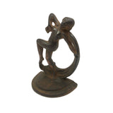 Cast Iron Art Nouveau Bookend with Super Folky Face