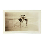 Friends on Beach with Shell in Hand, Ethereal Old Glossy Snapshot