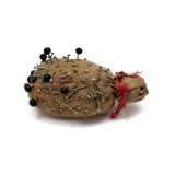 As Found, Evocative Old Sheepskin Emery Bundle with Pins Everywhere