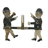 Antique Painted Tin Folk Art Pair of Figures in Bowlers with Pointing Arms