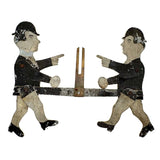 Antique Painted Tin Folk Art Pair of Figures in Bowlers with Pointing Arms
