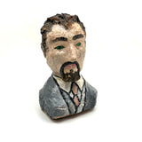 Folk Art Bust of Man in Suit with Inset Green Eyes , Plaster Over Wood with Polychrome