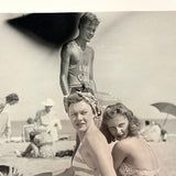Beach Scene with Heads Turned and Black Cloud Following Handsome Life Guard, c. 1950s Snapshot