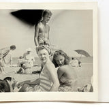 Beach Scene with Heads Turned and Black Cloud Following Handsome Life Guard, c. 1950s Snapshot