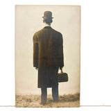 Man in Bowler and Oversized Coat, View From Behind, Elusive (Pre-Magritte) Antique RPPC