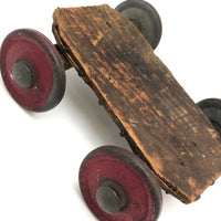 Very Sweet Little Homade Toy Cart with Red Wheels and Many Nails