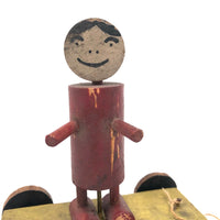 Red Man, Yellow Cart, Sweet Old Folk Art Pull Toy