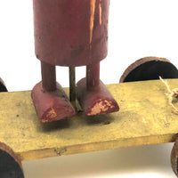 Red Man, Yellow Cart, Sweet Old Folk Art Pull Toy