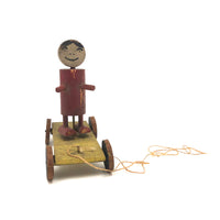 Red Man, Yellow Cart, Sweet Old Folk Art Pull Toy
