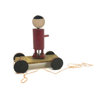 Red Man, Yellow Cart, Sweet Old Folk Art Pull Toy